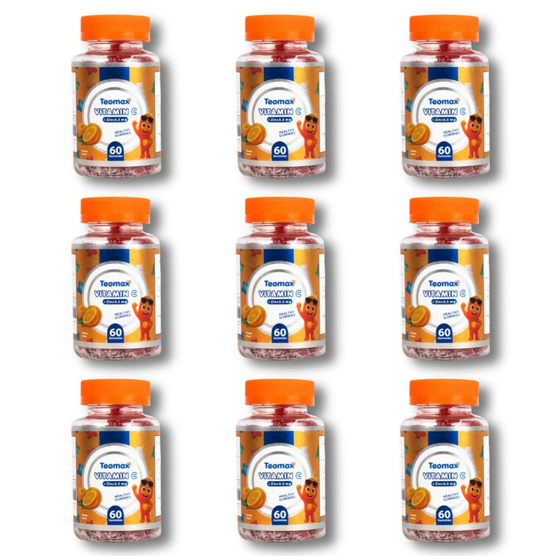 Multiple bottles of Teamax Vitamin C with orange caps on a white background